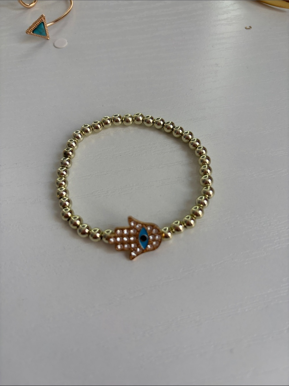 Gold Beaded Hamsa Charm Bracelet with Blue Eye